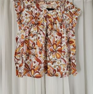 Ana Groovy top floral print ruffle edges PXL